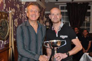 Ian McCluskey presents the Kvaerner 25-mile Trophy to Mark "Titch" Richards