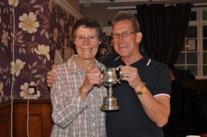 Chris Womack picks up Paul Dennington's Ernie Randall trophy from Freda Randall on his behalf