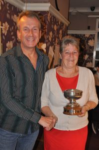 Pat Womack with the Women's Rose Bowl Trophy for her support of the sport (and Chris)