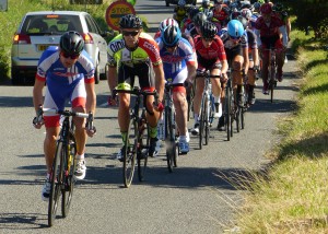 The bunch climbing out of Kenninghall on lap 3 (photo by Fergus Muir)